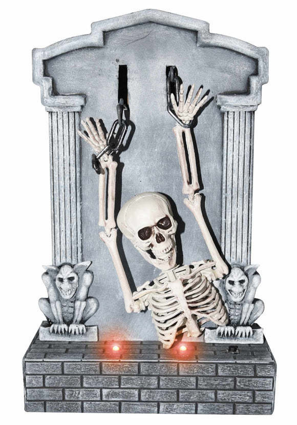 Skeleton Shaking on Tombstone